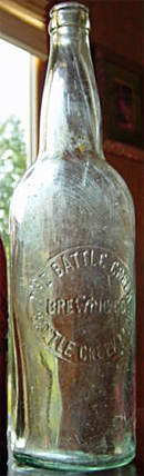 THE BATTLE CREEK BREWING COMPANY EMBOSSED BEER BOTTLE