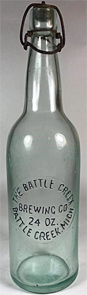 THE BATTLE CREEK BREWING COMPANY EMBOSSED BEER BOTTLE