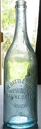 THE BATTLE CREEK BREWING COMPANY EMBOSSED BEER BOTTLE