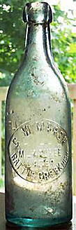 G. W. MARSH MILWAUKEE LAGER EMBOSSED BEER BOTTLE