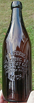 KOLB BROTHERS SALTZBURG BREWERY EMBOSSED BEER BOTTLE