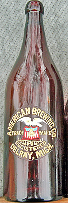 AMERICAN BREWING COMPANY EMBOSSED BEER BOTTLE