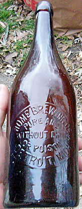 HOME BREWING COMPANY EMBOSSED BEER BOTTLE