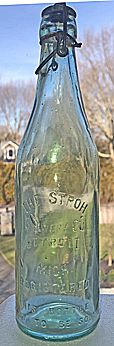 THE STROH BREWERY COMPANY EMBOSSED BEER BOTTLE