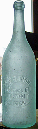 B. STROH BREWING COMPANY EMBOSSED BEER BOTTLE