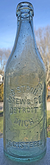 B. STROH BREWING COMPANY EMBOSSED BEER BOTTLE