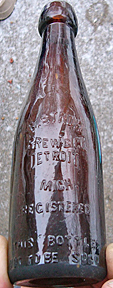 B. STROH BREWING COMPANY EMBOSSED BEER BOTTLE