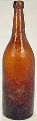 WEST SIDE BREWERY COMPANY EMBOSSED BEER BOTTLE