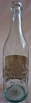 WEST SIDE BREWERY COMPANY EMBOSSED BEER BOTTLE