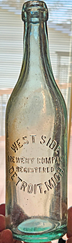 WEST SIDE BREWERY COMPANY EMBOSSED BEER BOTTLE