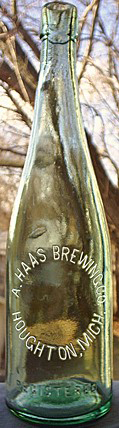 A. HAAS BREWING COMPANY EMBOSSED BEER BOTTLE