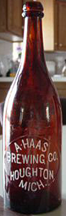 A. HAAS BREWING COMPANY EMBOSSED BEER BOTTLE