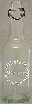 A. HAAS BREWING COMPANY EMBOSSED BEER BOTTLE