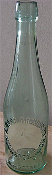 A. HAAS BREWING COMPANY EMBOSSED BEER BOTTLE