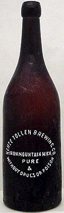 HENZE TOLLEN BREWING COMPANY EMBOSSED BEER BOTTLE