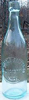 THE EBERLE BREWING COMPANY EMBOSSED BEER BOTTLE