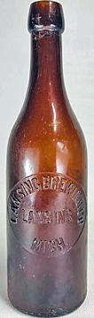 LANSING BREWING COMPANY EMBOSSED BEER BOTTLE