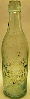 C. H. DANIELS BREWERY EMBOSSED BEER BOTTLE