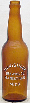 MANISTIQUE BREWING COMPANY EMBOSSED BEER BOTTLE