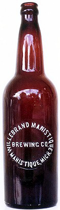 WILLEBRAND MANISTIQUE BREWING COMPANY EMBOSSED BEER BOTTLE