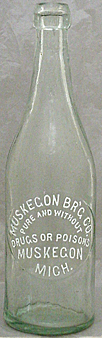 MUSKEGON BREWING COMPANY EMBOSSED BEER BOTTLE