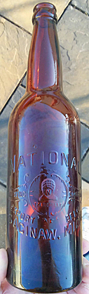 NATIONAL BREWING COMPANY EMBOSSED BEER BOTTLE