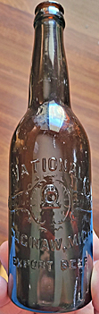 NATIONAL BREWING COMPANY EMBOSSED BEER BOTTLE