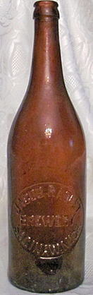 JACOB RAQUET BREWERY EMBOSSED BEER BOTTLE