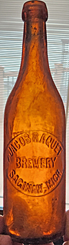 JACOB RAQUET BREWERY EMBOSSED BEER BOTTLE