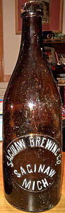 SAGINAW BREWING COMPANY EMBOSSED BEER BOTTLE