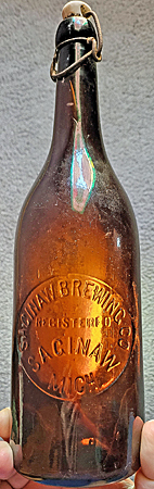 SAGINAW BREWING COMPANY EMBOSSED BEER BOTTLE