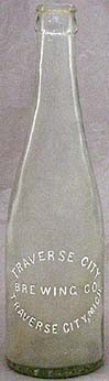 TRAVERSE CITY BREWING COMPANY EMBOSSED BEER BOTTLE