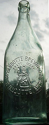 WYANDOTTE BREWING COMPANY EMBOSSED BEER BOTTLE