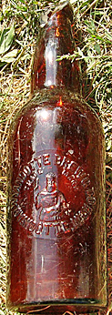 WYANDOTTE BREWING COMPANY EMBOSSED BEER BOTTLE