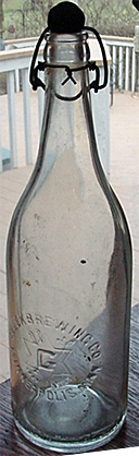 GLUEK BREWING COMPANY EMBOSSED BEER BOTTLE