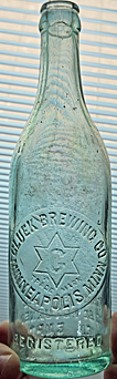 GLUEK BREWING COMPANY EMBOSSED BEER BOTTLE