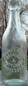 MINNEAPOLIS BREWING & BOTTLING COMPANY EMBOSSED BEER BOTTLE