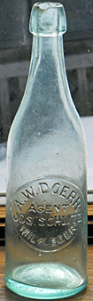 JOSEPH SCHLITZ'S MILWAUKEE BEER EMBOSSED BEER BOTTLE