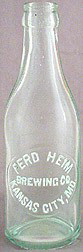 FERD HEIM BREWING COMPANY EMBOSSED BEER BOTTLE