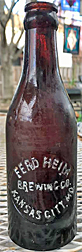 FERD HEIM BREWING COMPANY EMBOSSED BEER BOTTLE