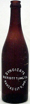 THE SYNDICATE BEER BOTTLING COMPANY EMBOSSED BEER BOTTLE