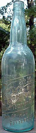 THE AMERICAN BREWING COMPANY EMBOSSED BEER BOTTLE