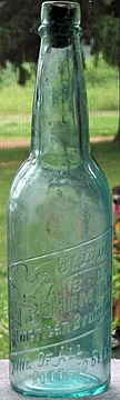 THE AMERICAN BREWING COMPANY EMBOSSED BEER BOTTLE