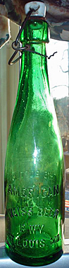 AMERICAN WEISS BEER BREWERY EMBOSSED BEER BOTTLE