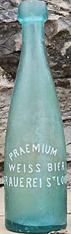 PRAEMIUM WEISS BIER BRAUEREI EMBOSSED BEER BOTTLE