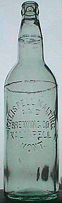 KALISPELL MALTING AND BREWING COMPANY EMBOSSED BEER BOTTLE