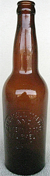 KALISPELL MALTING AND BREWING COMPANY EMBOSSED BEER BOTTLE