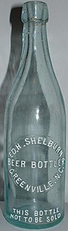 ED. H. SHELBURN BEER BOTTLER EMBOSSED BEER BOTTLE