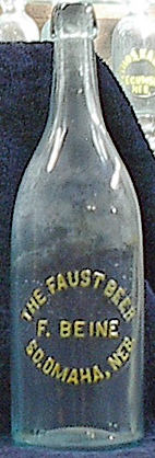 THE FAUST BEER EMBOSSED BEER BOTTLE