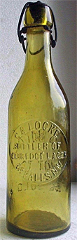 C. A. LOCKE BOTTLER ELDREDGE LAGER EMBOSSED BEER BOTTLE